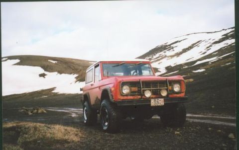 1974 Ford Bronco - Red 1974 Ford Bronco in a , snowy Icelandic landscape.