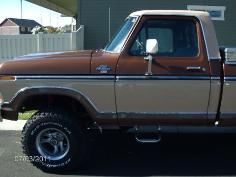 1979 Ford F-150 - Side view of a 1979 Ford F-150 pickup truck with two-tone brown and tan paint.