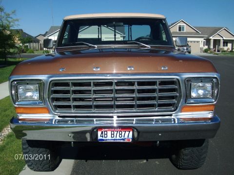 1979 Ford F-150 - This Ford F-150 has a prominent chrome grille and a two-tone paint scheme with a tan roof.