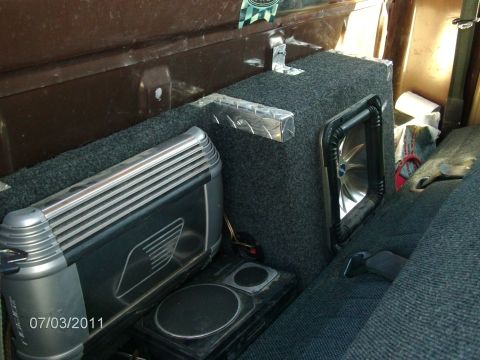 1979 Ford F-150 - Custom audio setup in the rear of a pickup truck, subwoofers and an amplifier.