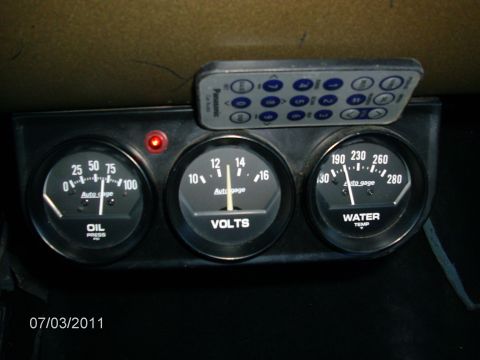 1979 Ford F-150 - A set of aftermarket Auto Gage instruments are mounted in the dashboard, including oil pressure, volts, and water temperature gauges.