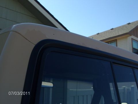 1979 Ford F-150 - Close-up of a truck's roof and window trim, with a date stamp in the corner.