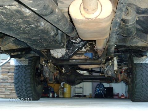1979 Ford F-150 - The undercarriage of a truck, revealing its mechanical components and exhaust system.