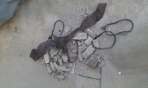 1992 Ford Ranger - Debris and twisted metal are scattered on a concrete surface.
