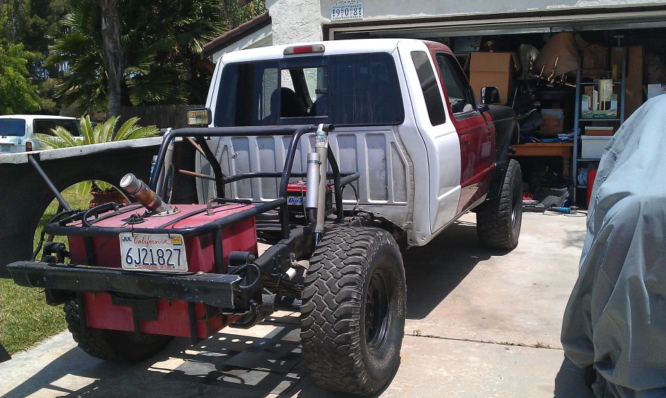 1992 Ford Ranger custom build, rear view showing large fuel tank and off-road tires
