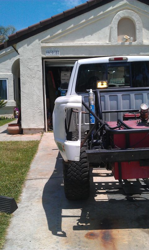 1992 Ford Ranger - This modified truck chassis is undergoing custom bodywork, a large red fuel tank and off-road tires.