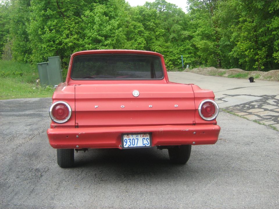 1964 Ford Ranchero rear view, red paint, license plate 9307 CS