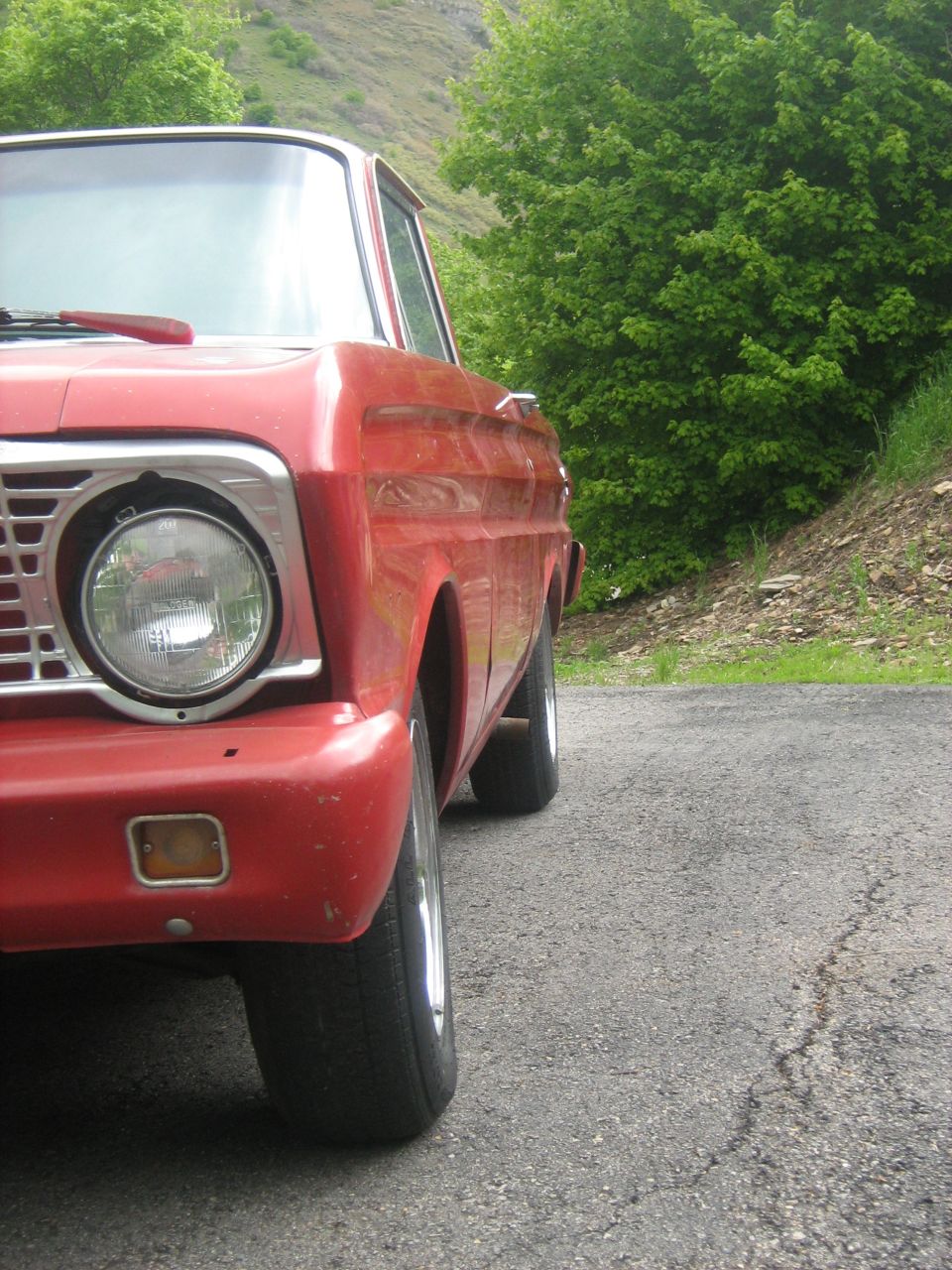 Red 1964 Ford Ranchero front quarter view