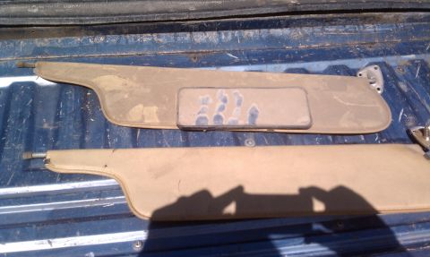 1979 Ford Bronco - These sun visors appear to be used parts, one a vanity mirror with some smudges.