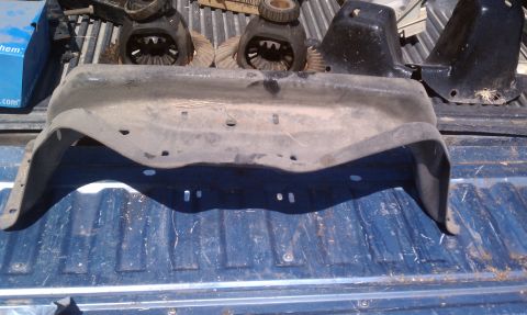 1979 Ford Bronco - Differential gears and a fender liner are shown in a truck bed, with a "Supermotors.net" watermark.