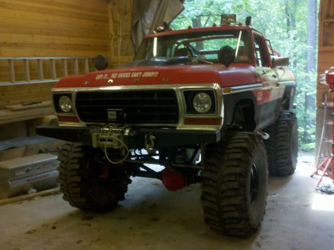 1979 Ford Bronco - This modified 1979 Ford Bronco features a lifted suspension and oversized tires, ready for off-road adventures.