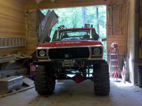 1979 Ford Bronco - This lifted 1979 Ford Bronco features oversized tires and a front-mounted winch, ready for off-road adventures.