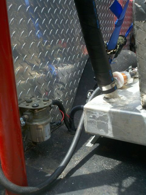 1979 Ford Bronco - Close-up of a fuel filter and pump assembly, likely part of a custom setup.