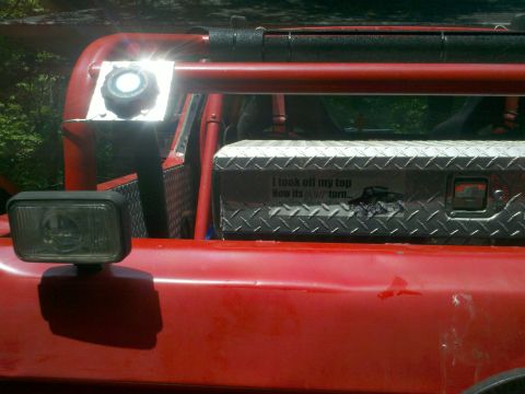 1979 Ford Bronco - This off-road vehicle features a diamond plate toolbox with a humorous sticker and a spare tire mount.
