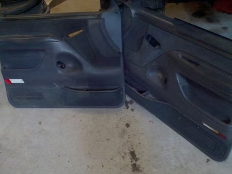 2005 Ford F-250 - Pair of truck door panels shown, possibly for a Ford F-250.