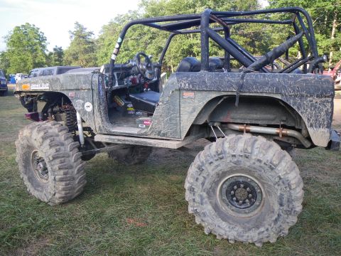 1995 Ford Bronco - This heavily modified off-road vehicle appears to be a custom build with extensive modifications.