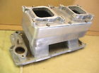 1953 Ford Mainline - An aluminum intake manifold is shown from a side angle.