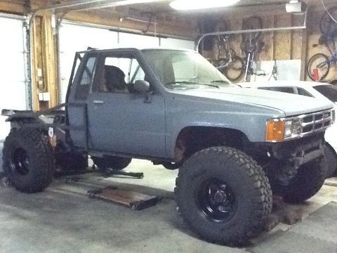 1988 Suzuki Samurai - This modified pickup truck appears to be from the mid-1980s, not a 1988 Suzuki Samurai.