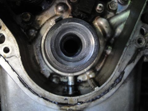 1993 Ford Taurus - Engine crankshaft seal housing detail, showing internal splines and surrounding metal components.