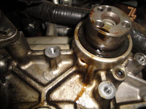 1993 Ford Taurus - This image shows a close-up of an engine part, not a 1993 Ford Taurus.