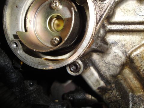 1993 Ford Taurus - This is a close-up view of an engine's oil pump, showing internal components and signs of wear.