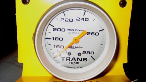 1996 Ford Bronco - This Auto Meter gauge monitors transmission fluid temperature, with markings from 160 to 280 degrees Fahrenheit.