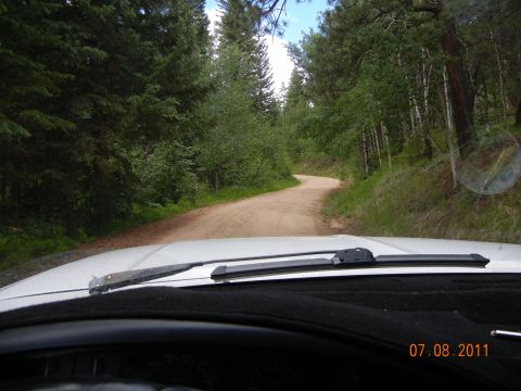 1996 Ford Bronco - Driving through a wooded area on a dirt road, with a timestamp of 07.08.2011 visible.