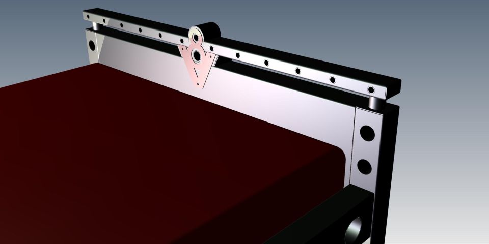 Bed frame with red mattress and chrome accents