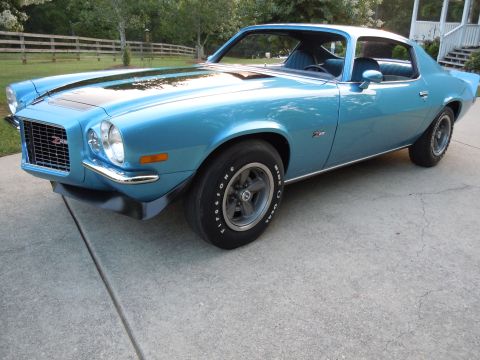 1972 Chevrolet Camaro - This 1970 Chevrolet Camaro Z28 features a distinctive front end and a blue exterior with black racing stripes.