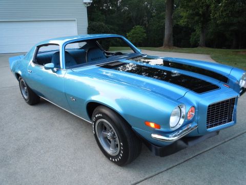 1972 Chevrolet Camaro - This 1970 Chevrolet Camaro coupe features a bright blue paint job and black racing stripes on the hood.