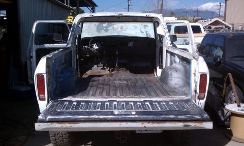 1978 Ford Bronco - Interior view of a dismantled 1978 Ford F-150 pickup truck, ready for restoration.