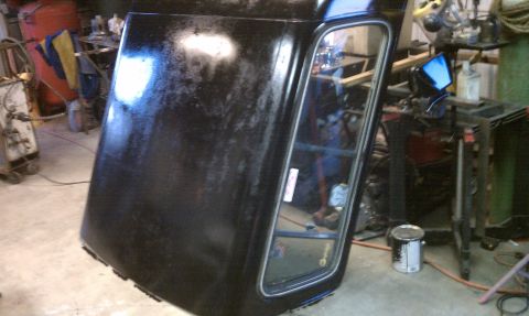 1978 Ford Bronco - The removable hardtop of a 1978 Ford Bronco is shown during interior stripping and painting.