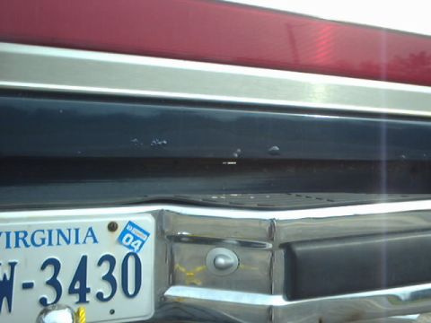 1990 Ford Bronco - Close-up of a rear bumper and license plate from a vehicle registered in Virginia.