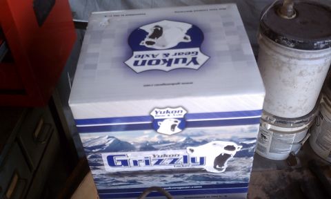 1978 Ford Bronco - A box for a Yukon Grizzly Locker is shown, with branding and graphics.