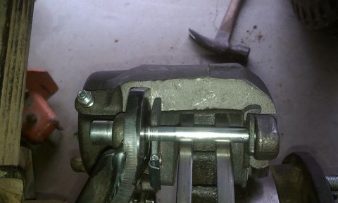 1978 Ford Bronco - Brake caliper assembly detail, likely during a repair or rebuild process.