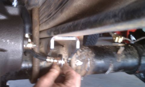 1978 Ford Bronco - Brake line connection to the rear axle assembly.