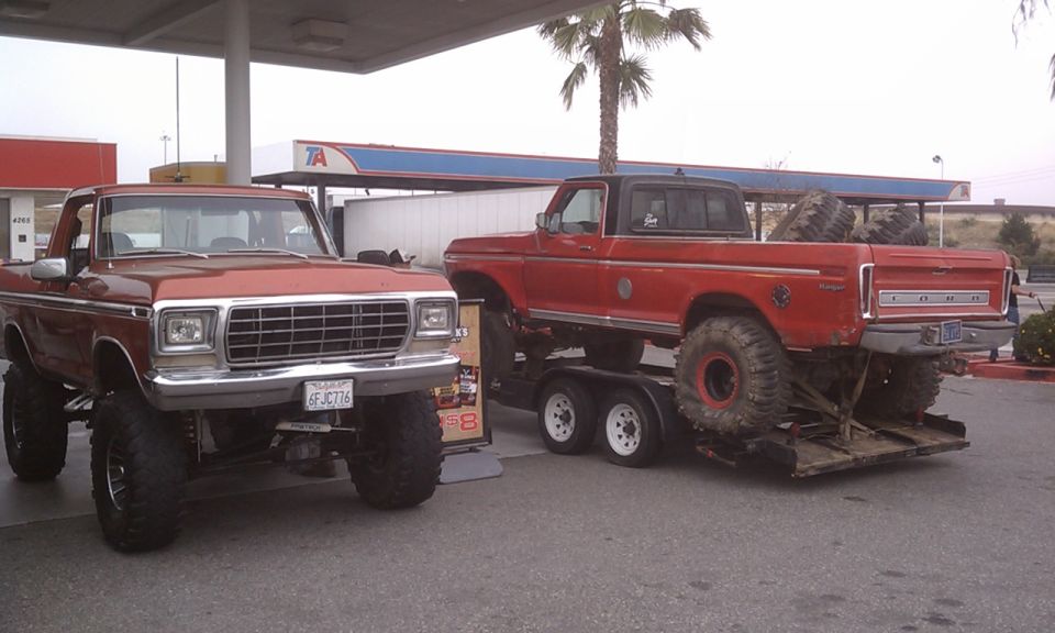 Brown 1978 Ford Bronco front view, lifted with large tires