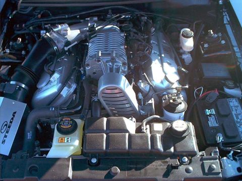 2000 Ford Crown Victoria - Close-up of a supercharged V8 engine, likely from a performance vehicle.
