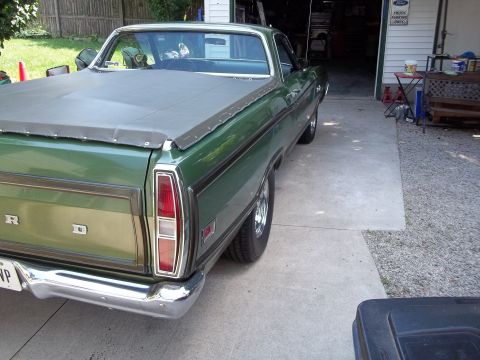 1970 Ford Ranchero - Rear view of a green 1970 Ford Ranchero pickup truck with a tonneau cover.