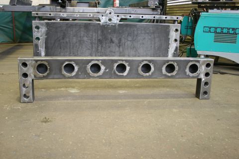 1973 Ford Ranchero - Custom fabricated steel part with numerous circular cutouts and mounting points.