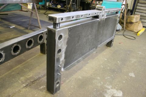 1973 Ford Ranchero - Fabricated steel component with numerous holes, likely for assembly or mounting.