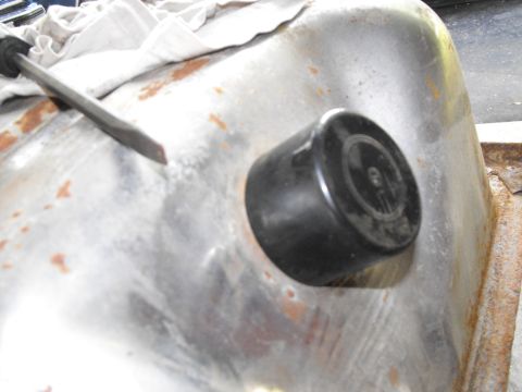 1986 Ford Bronco - It's worth repeating; place an spray can lid over the tank spout to prevent rust and dirt from falling in during removal and replacement.