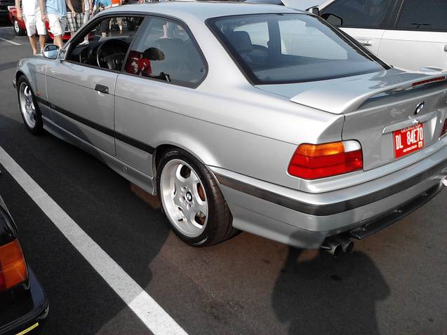 Silver 1997 BMW M3 coupe, rear 3/4 view