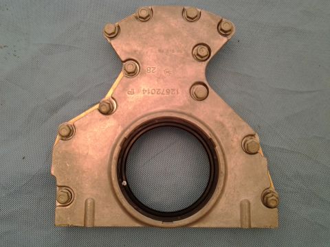 1996 Yamaha RA760 WaveRaider 2-P - Engine crankshaft seal housing with part number 12572014 TP visible.