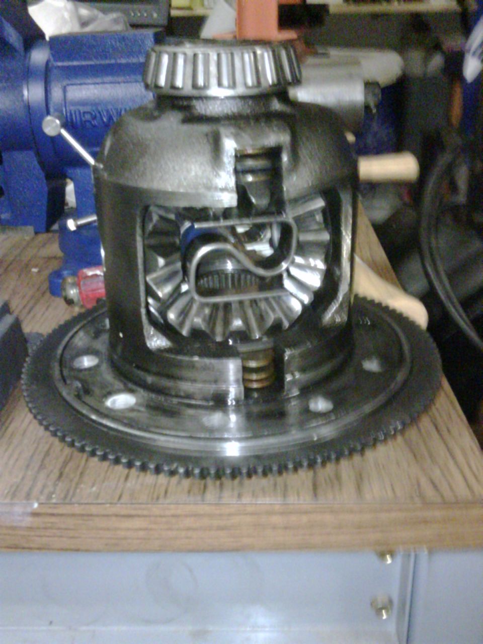 Differential with open case showing gears and pinion