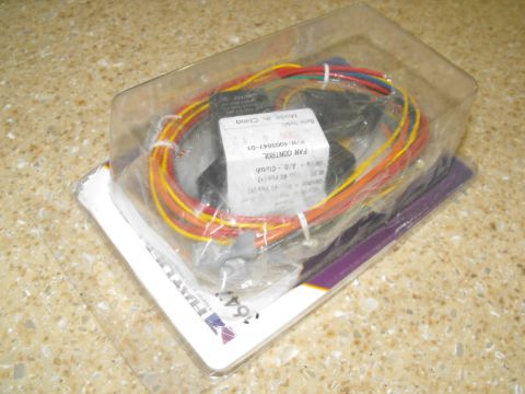 1994 Ford Bronco - A fan control module for an A/C clutch is shown in its original packaging.