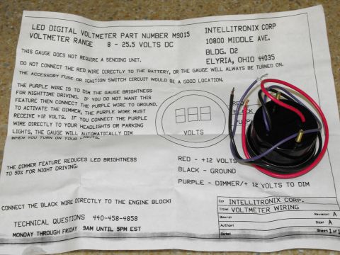 1994 Ford Bronco - A digital voltmeter gauge with its wiring and installation manual is shown.