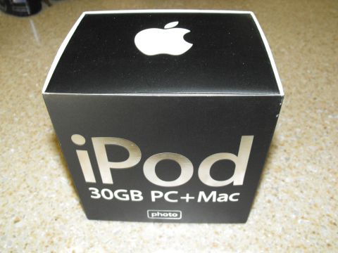 1994 Ford Bronco - Box for an iPod 30GB PC+Mac, the Apple logo and product details.