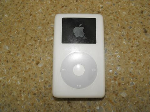 1994 Ford Bronco - A white iPod Classic with the Apple logo is shown on a speckled countertop.