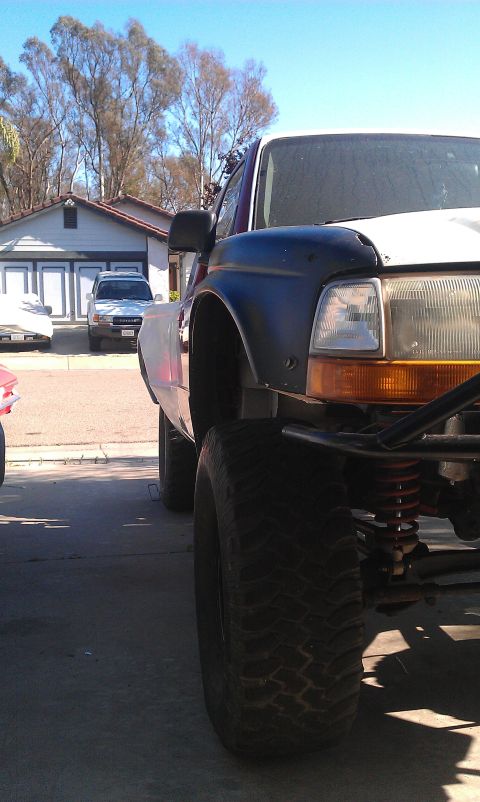 1992 Ford Ranger - Modified 1992 Ford Ranger pickup truck with aftermarket suspension and large tires.